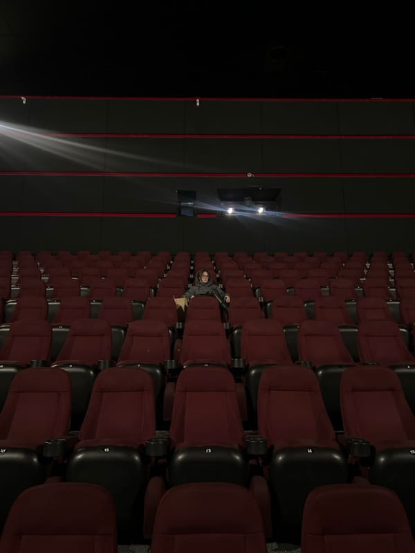 Lone moviegoer sits in empty Odesa cinema hall
