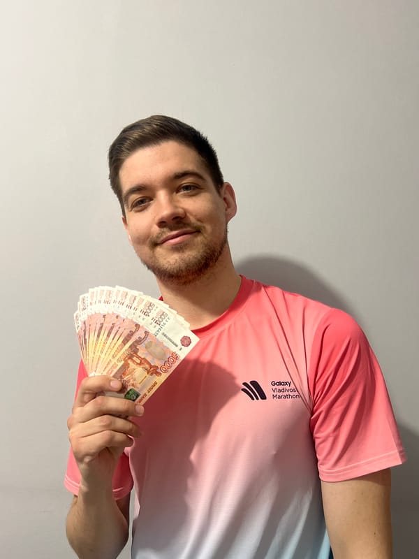 Man displays stack of rubles in Kazan