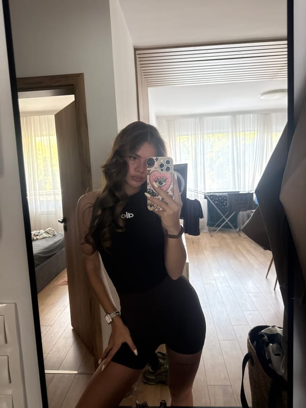 Mirror selfie session across two rooms in Plovdiv