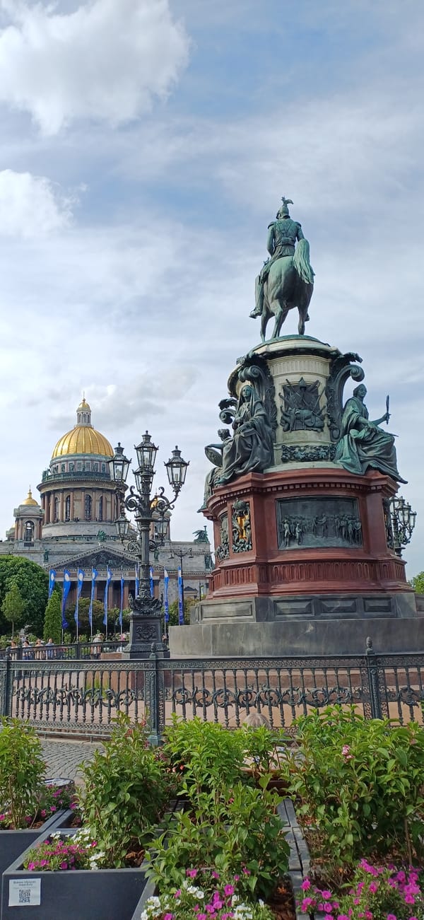 Visitor documents Saint Isaac's Cathedral and summer flower displays