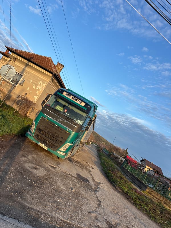 Commercial truck parked on rural road in Bulgaria