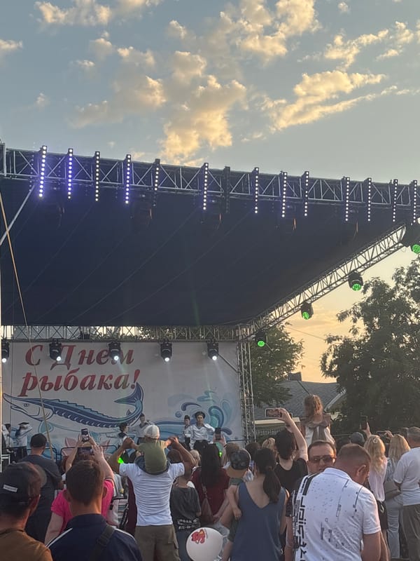 Fisherman's Day festival on Astrakhan's Volga embankment at sunset