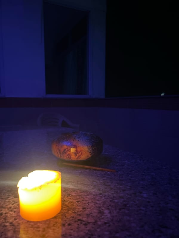 Candlelit tongue drum session recorded in Puttaparthi home