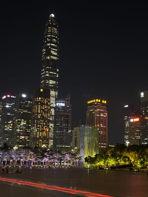 Nighttime documentation of illuminated Futian District skyline in Shenzhen