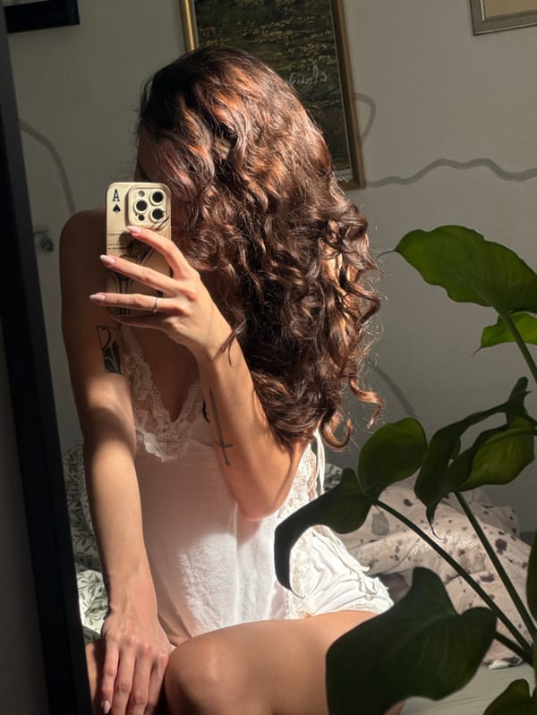 Mirror selfie captured in Tel-Aviv indoor setting