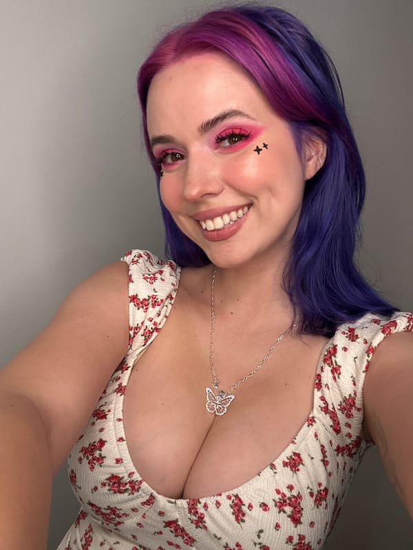 Woman takes colorful selfies with anime plushie in Ljubljana