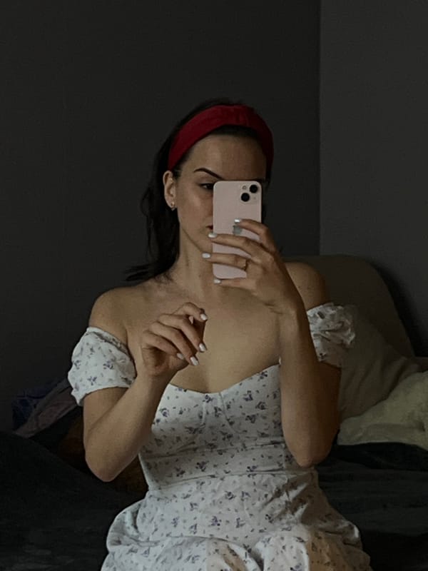 Woman documents selfies and online activity in Shushary home