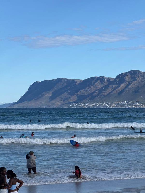 Afternoon beach life documented at Muizenberg surf spot