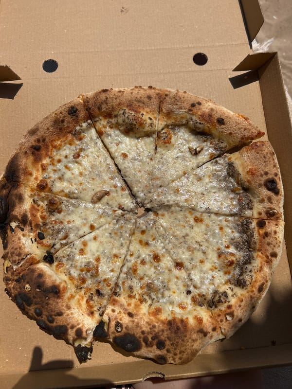 Beach day in Chernomorets: pizza, sun, and seaside streets