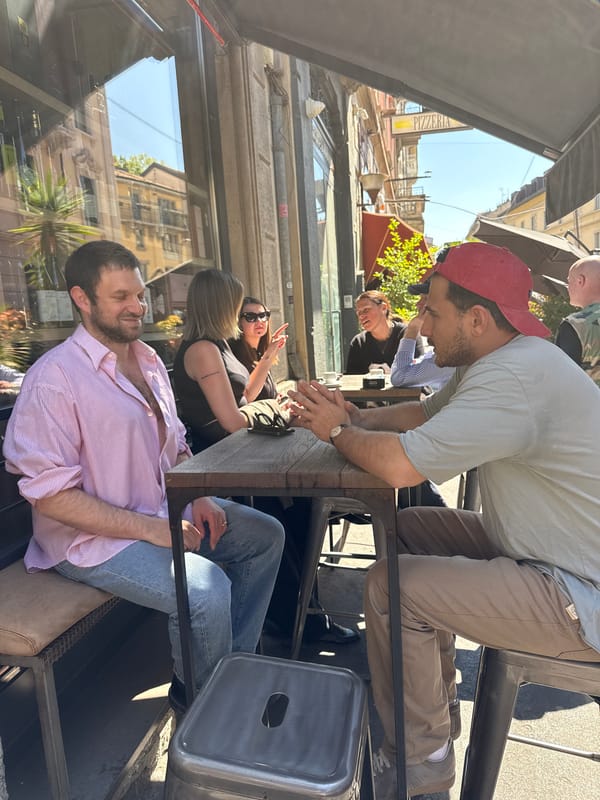 Outdoor dining scene captured at Milan café