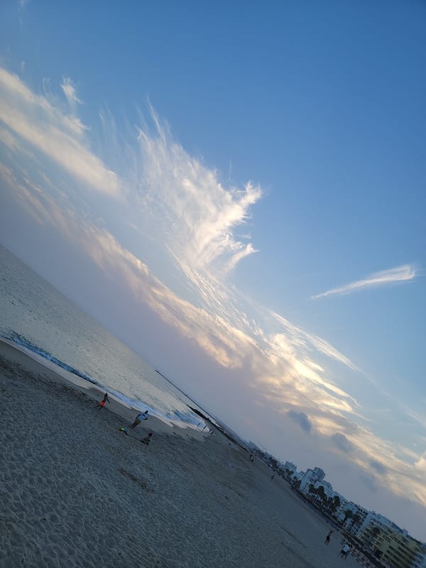 Quarteira beach at sunset, solstice evening