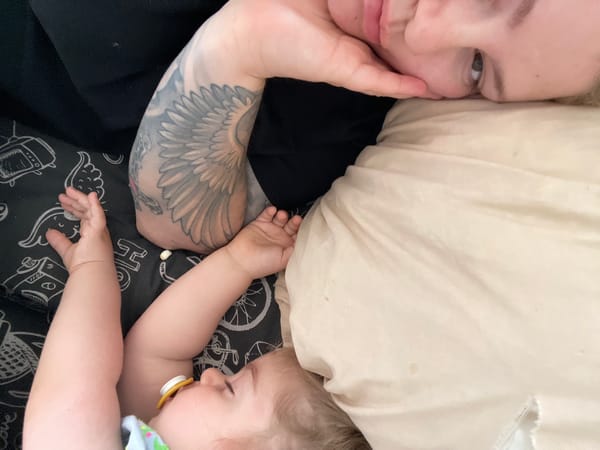 Mother and child rest together in Senden home