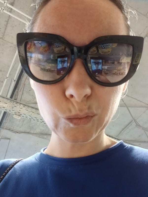 A day out in Yekaterinburg, seen through black cat-eye sunglasses.