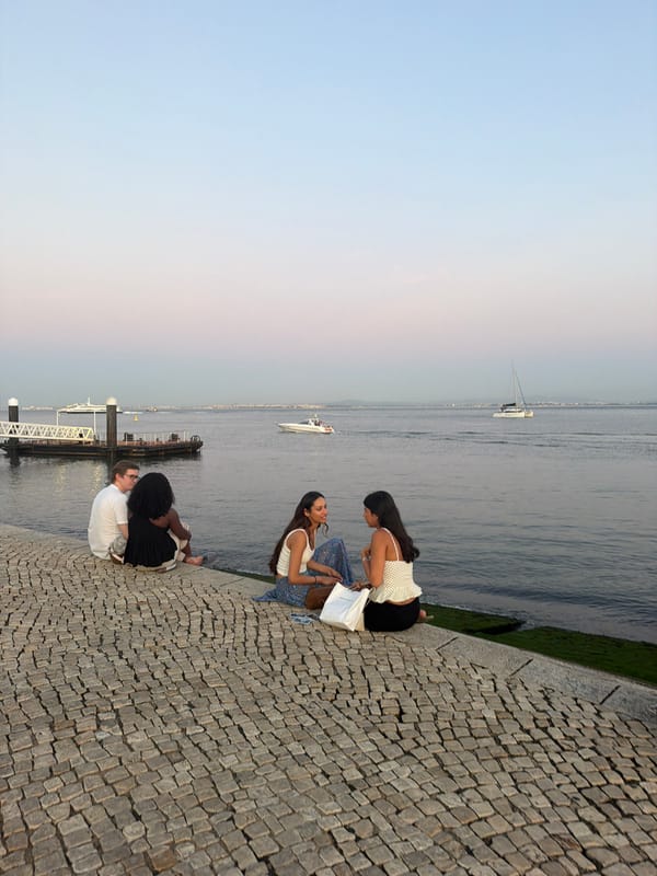 Lisbon's Tagus waterfront at dusk, markets and river views