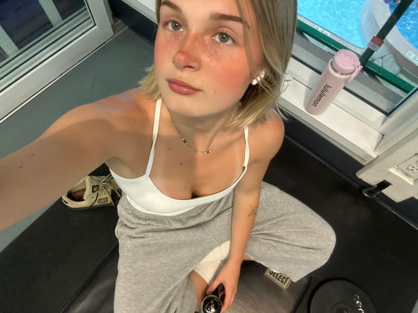 Woman takes workout selfie in Whistler fitness area