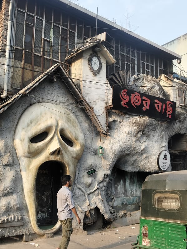 Street vendors conduct daily business across Dhaka neighborhoods