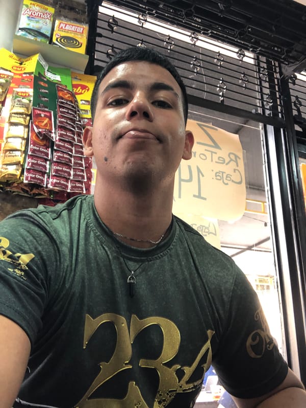 Man takes selfie in small Venezuelan store