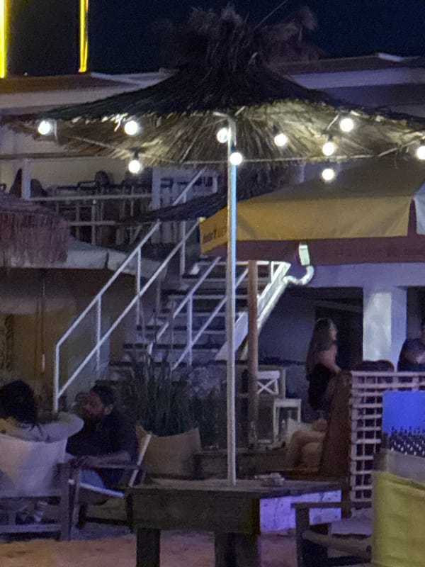 Night out at a beachside bar with waterfront views