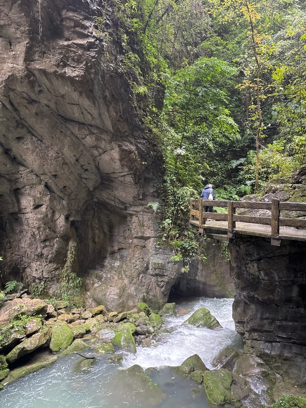 Tourists visit waterfalls and gorges in Wulong District