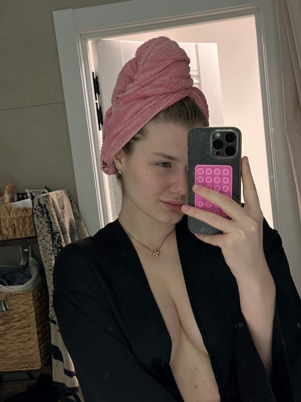 Woman takes bathroom selfie in Russian town