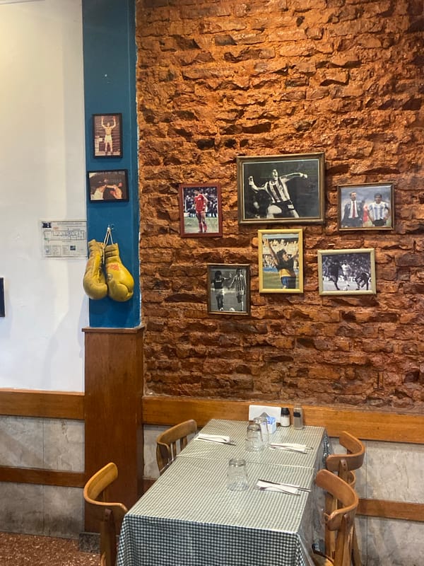 Restaurant interior with Argentine soccer memorabilia captured in Buenos Aires