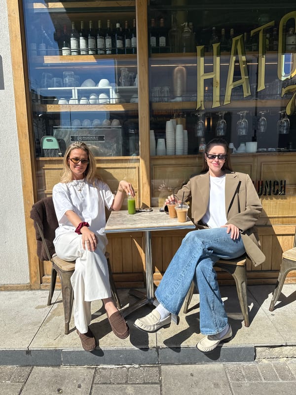 Londoners enjoy outdoor café dining during sunny midday break