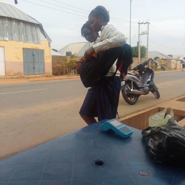 Morning street life in Gombe, Nigeria — foot traffic and motos