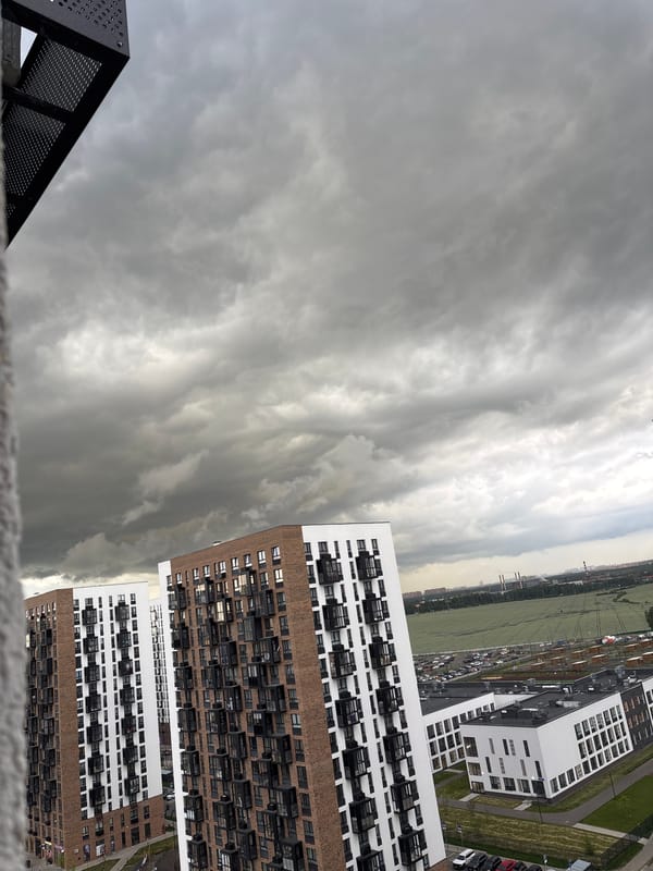 Storm clouds gather over Misaylovo apartment blocks