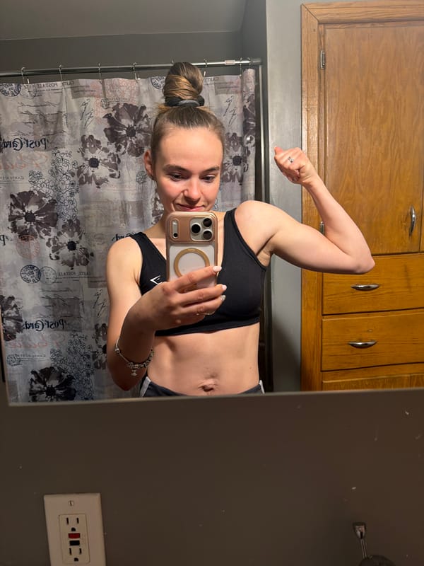Woman Takes Fitness Mirror Selfie in Reedsburg Bathroom