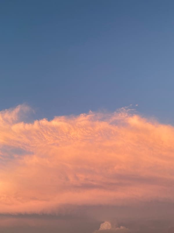 Sunset cityscape with dramatic pink clouds from multiple angles