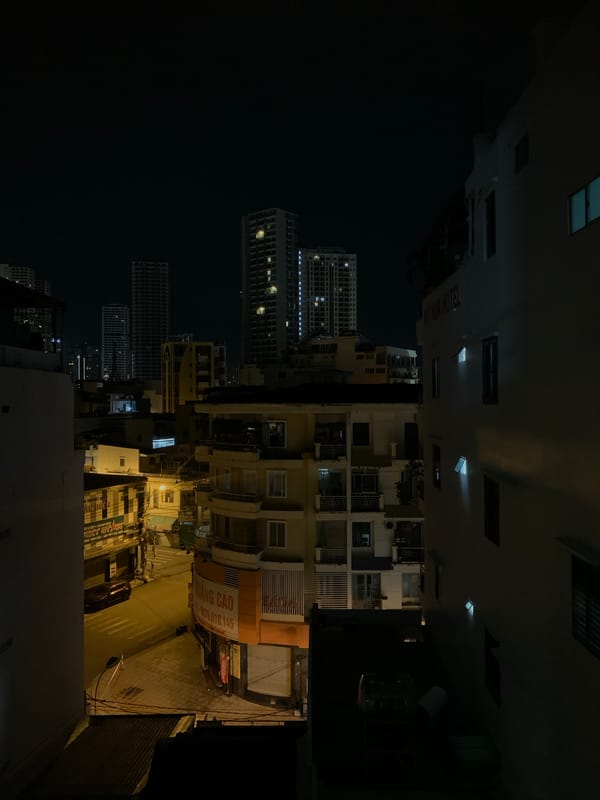 Nha Trang urban streets at night, looking down from above