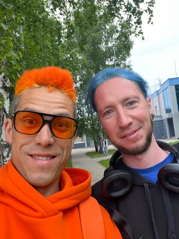 Two men take selfie outdoors in Chaikovsky, Russia