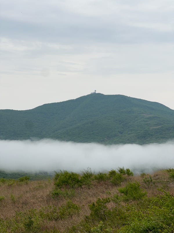 Foggy mountain landscape observed in Vityaz', Russia