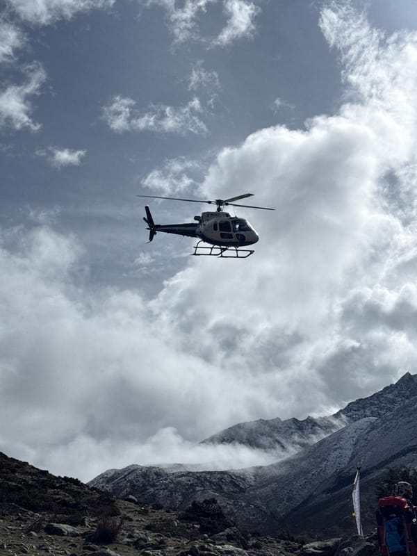 Helicopter spotted over mountainous terrain in Khumjung, Nepal