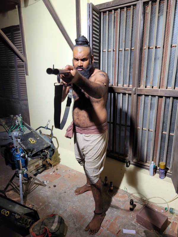 Armed man observed indoors by witness