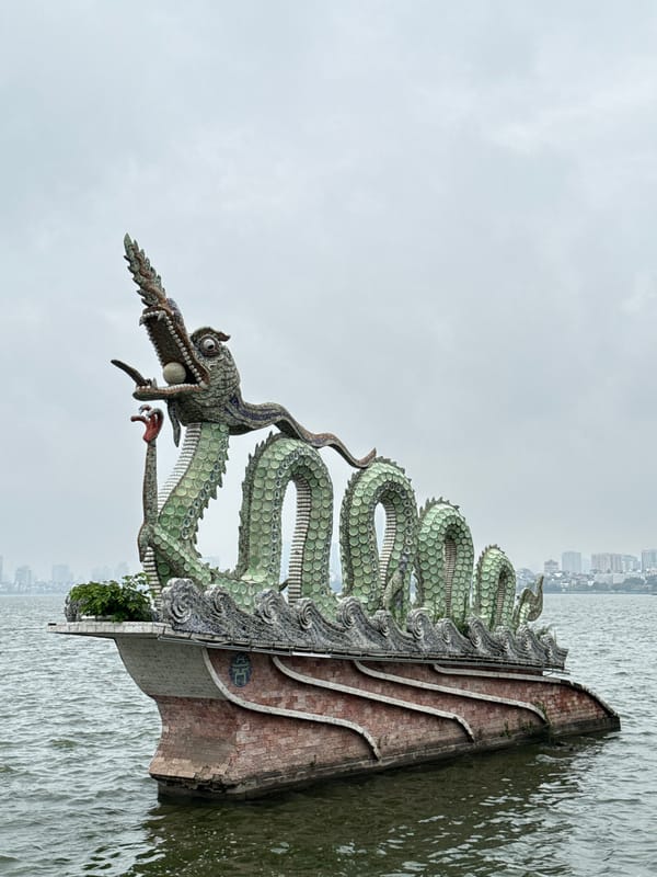 Dragon monuments spotted around Hanoi lakes amid police presence