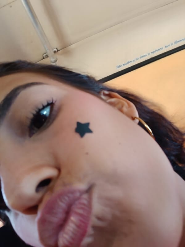 Person takes decorated selfies with star stickers in Venezuela