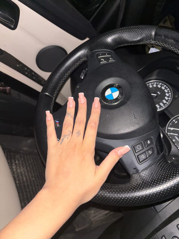 Driver with manicured nails photographed in BMW in Bulgaria