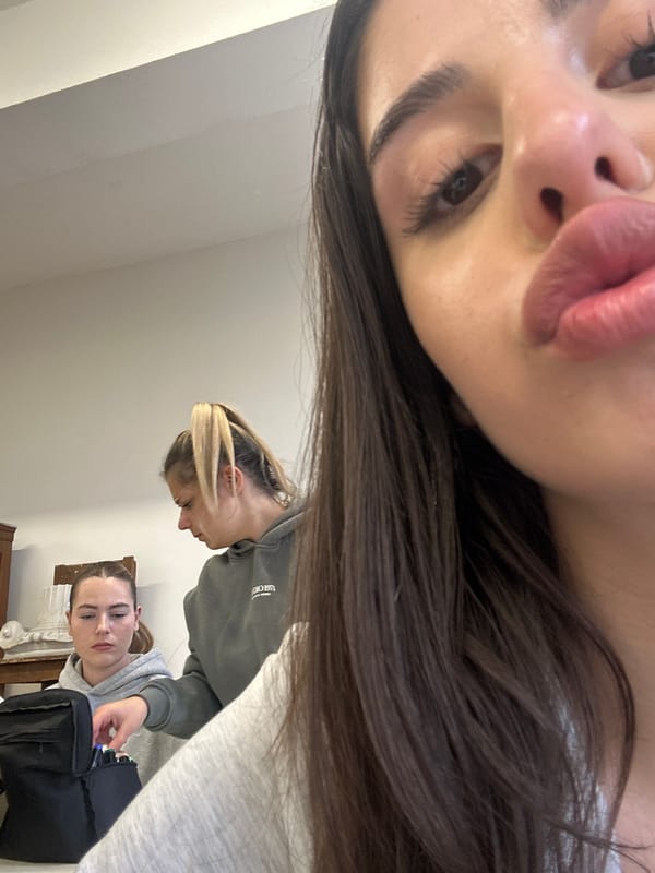 Person takes selfies, works on art project in Sofia studio