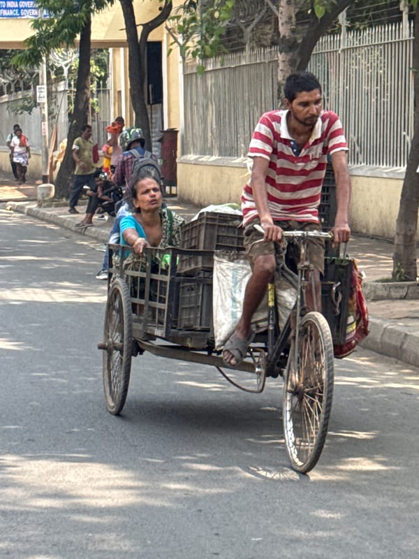 Early morning street life documented across Kolkata neighborhood
