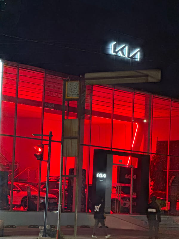 Night dealership and daytime gathering documented in Puebla