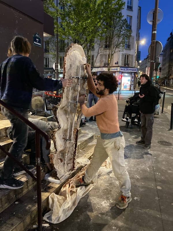 Artist builds tiered display outside Paris Franprix store
