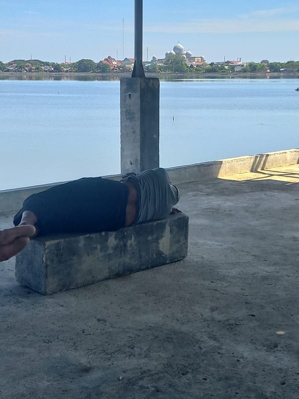 Early morning waterfront activity documented in Lhokseumawe, Indonesia