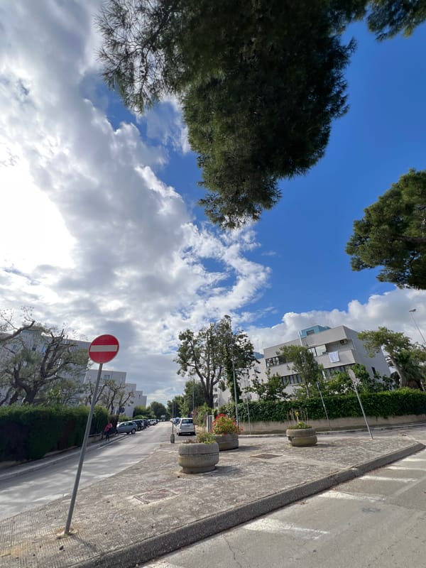 Morning street life documented across Bari, Italy