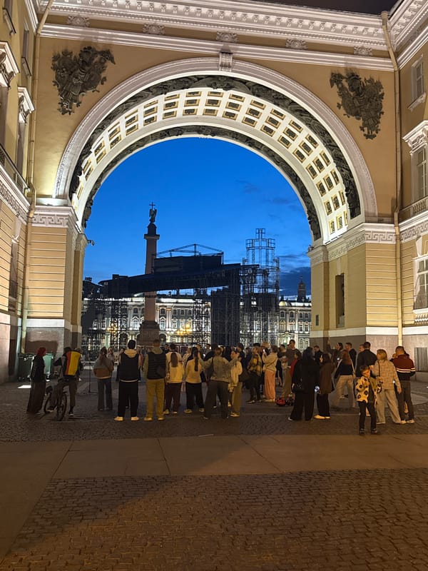 Street performance in Palace Square at dusk, Saint Petersburg