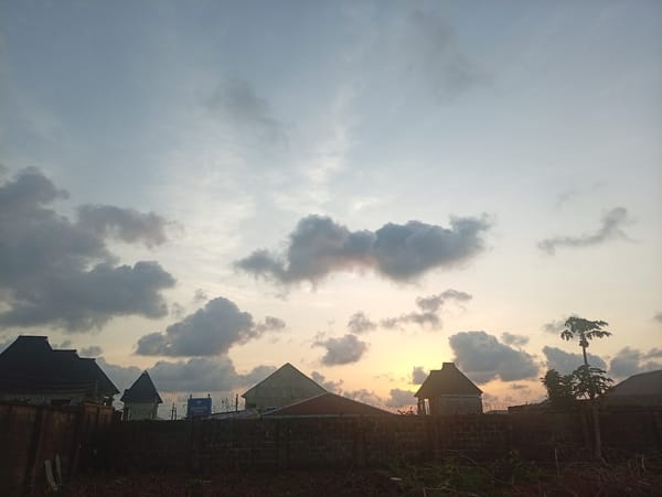 Sand art symbols drawn at sunset in Ikorodu