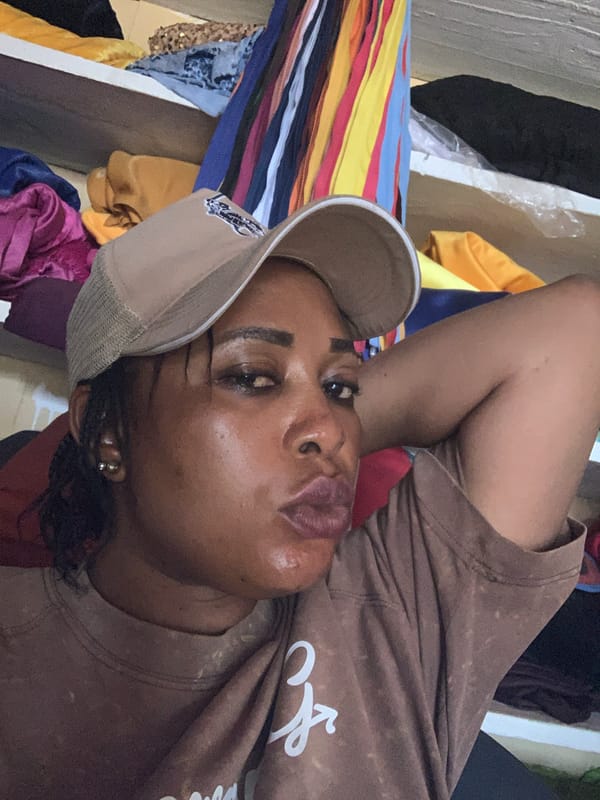 Casual indoor hangout near a small shop in Kaduna, Nigeria