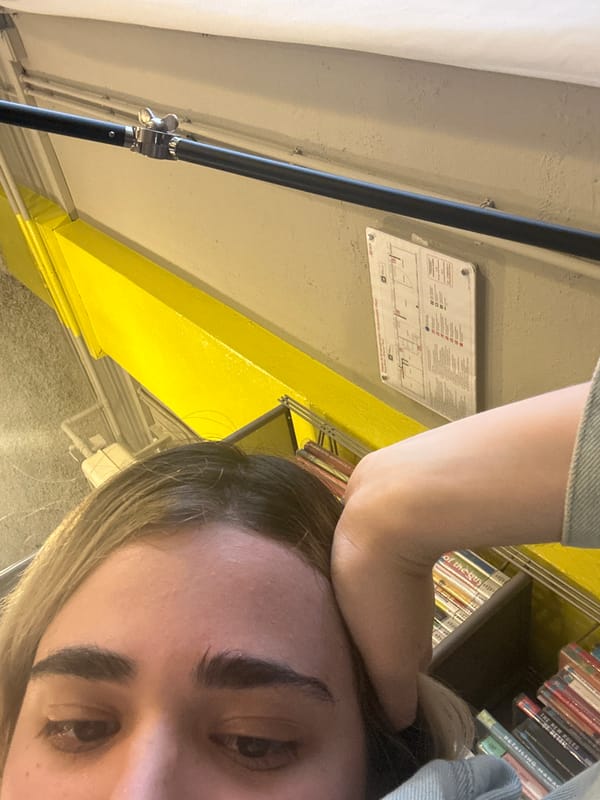 Person takes selfie in Milan bookstore