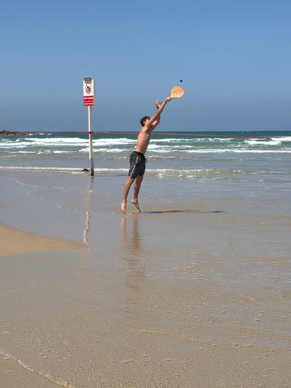 Morning beach activities observed along Tel Aviv shoreline