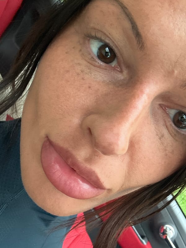 Woman photographed near vehicle in Tunbridge Wells